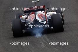 Daniil Kvyat (RUS) Scuderia Toro Rosso STR9 sparks through Eau Rouge. 23.08.2014. Formula 1 World Championship, Rd 12, Belgian Grand Prix, Spa Francorchamps, Belgium, Qualifying Day.