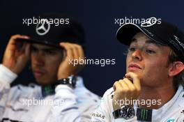 Pole sitter Nico Rosberg (GER) Mercedes AMG F1 (Right) and team mate Lewis Hamilton (GBR) Mercedes AMG F1 in the qualifying FIA Press Conference. 23.08.2014. Formula 1 World Championship, Rd 12, Belgian Grand Prix, Spa Francorchamps, Belgium, Qualifying Day.