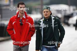 (L to R): Alexander Rossi (USA) Marussia F1 Team Reserve Driver with Marcus Ericsson (SWE) Caterham. 23.08.2014. Formula 1 World Championship, Rd 12, Belgian Grand Prix, Spa Francorchamps, Belgium, Qualifying Day.