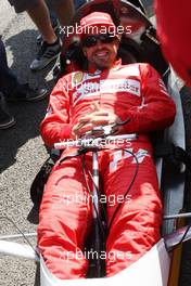 Fernando Alonso (ESP) Ferrari drives a car from the Shell Eco Marathon. 21.08.2014. Formula 1 World Championship, Rd 12, Belgian Grand Prix, Spa Francorchamps, Belgium, Preparation Day.