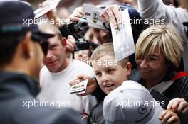 Lewis Hamilton (GBR) Mercedes AMG F1 signs autographs for the fans. 21.08.2014. Formula 1 World Championship, Rd 12, Belgian Grand Prix, Spa Francorchamps, Belgium, Preparation Day.