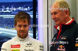 (L to R): Sebastian Vettel (GER) Red Bull Racing with Dr Helmut Marko (AUT) Red Bull Motorsport Consultant. 04.04.2014. Formula 1 World Championship, Rd 3, Bahrain Grand Prix, Sakhir, Bahrain, Practice Day