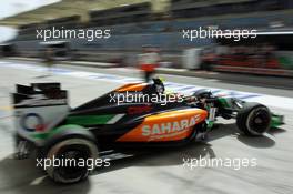Sergio Perez (MEX) Sahara Force India F1 VJM07 leaves the pits. 04.04.2014. Formula 1 World Championship, Rd 3, Bahrain Grand Prix, Sakhir, Bahrain, Practice Day