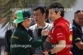 (L to R): Kamui Kobayashi (JPN) Caterham with Massimo Rivola (ITA) Ferrari Sporting Director. 04.04.2014. Formula 1 World Championship, Rd 3, Bahrain Grand Prix, Sakhir, Bahrain, Practice Day