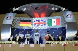 The podium (L to R): Nico Rosberg (GER) Mercedes AMG F1, second; Lewis Hamilton (GBR) Mercedes AMG F1, race winner; Sergio Perez (MEX) Sahara Force India F1, third. 06.04.2014. Formula 1 World Championship, Rd 3, Bahrain Grand Prix, Sakhir, Bahrain, Race Day.