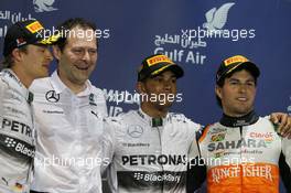 The podium (L to R): Nico Rosberg (GER) Mercedes AMG F1, second; Aldo Costa (ITA) Mercedes AMG F1 Engineering Director; Lewis Hamilton (GBR) Mercedes AMG F1, race winner; Sergio Perez (MEX) Sahara Force India F1, third. 06.04.2014. Formula 1 World Championship, Rd 3, Bahrain Grand Prix, Sakhir, Bahrain, Race Day.