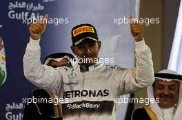 Race winner Lewis Hamilton (GBR) Mercedes AMG F1 celebrates on the podium. 06.04.2014. Formula 1 World Championship, Rd 3, Bahrain Grand Prix, Sakhir, Bahrain, Race Day.