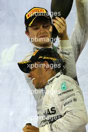 Lewis Hamilton (GBR), Mercedes AMG F1 Team and Nico Rosberg (GER), Mercedes AMG F1 Team  06.04.2014. Formula 1 World Championship, Rd 3, Bahrain Grand Prix, Sakhir, Bahrain, Race Day.