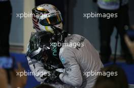 Lewis Hamilton (GBR) Mercedes AMG F1 and Nico Rosberg (GER) Mercedes AMG F1. 06.04.2014. Formula 1 World Championship, Rd 3, Bahrain Grand Prix, Sakhir, Bahrain, Race Day.