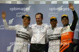 1st place Lewis Hamilton (GBR) Mercedes AMG F1, 2nd place Nico Rosberg (GER) Mercedes AMG F1 and 3rd place Sergio Perez (MEX) Sahara Force India F1. 06.04.2014. Formula 1 World Championship, Rd 3, Bahrain Grand Prix, Sakhir, Bahrain, Race Day.
