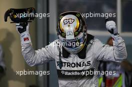 Race winner Lewis Hamilton (GBR) Mercedes AMG F1 celebrates in parc ferme. 06.04.2014. Formula 1 World Championship, Rd 3, Bahrain Grand Prix, Sakhir, Bahrain, Race Day.
