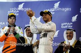 Race winner Lewis Hamilton (GBR) Mercedes AMG F1 celebrates on the podium. 06.04.2014. Formula 1 World Championship, Rd 3, Bahrain Grand Prix, Sakhir, Bahrain, Race Day.