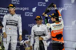 The podium (L to R): Nico Rosberg (GER) Mercedes AMG F1, second; Lewis Hamilton (GBR) Mercedes AMG F1, race winner; Sergio Perez (MEX) Sahara Force India F1, third. 06.04.2014. Formula 1 World Championship, Rd 3, Bahrain Grand Prix, Sakhir, Bahrain, Race Day.