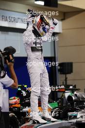 Race winner Lewis Hamilton (GBR) Mercedes AMG F1 W05 celebrates in parc ferme. 06.04.2014. Formula 1 World Championship, Rd 3, Bahrain Grand Prix, Sakhir, Bahrain, Race Day.