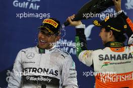 The podium (L to R): Race winner Lewis Hamilton (GBR) Mercedes AMG F1 celebrates with third placed Sergio Perez (MEX) Sahara Force India F1. 06.04.2014. Formula 1 World Championship, Rd 3, Bahrain Grand Prix, Sakhir, Bahrain, Race Day.