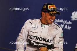 Race winner Lewis Hamilton (GBR) Mercedes AMG F1 celebrates on the podium. 06.04.2014. Formula 1 World Championship, Rd 3, Bahrain Grand Prix, Sakhir, Bahrain, Race Day.