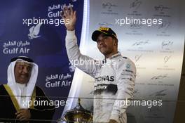 Race winner Lewis Hamilton (GBR) Mercedes AMG F1 celebrates on the podium. 06.04.2014. Formula 1 World Championship, Rd 3, Bahrain Grand Prix, Sakhir, Bahrain, Race Day.