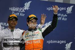 The podium (L to R): Race winner Lewis Hamilton (GBR) Mercedes AMG F1 celebrates with third placed Sergio Perez (MEX) Sahara Force India F1. 06.04.2014. Formula 1 World Championship, Rd 3, Bahrain Grand Prix, Sakhir, Bahrain, Race Day.