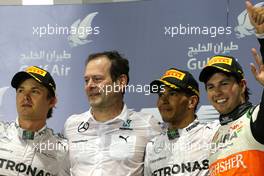 Lewis Hamilton (GBR), Mercedes AMG F1 Team and Nico Rosberg (GER), Mercedes AMG F1 Team and Sergio Perez (MEX), Sahara Force India  06.04.2014. Formula 1 World Championship, Rd 3, Bahrain Grand Prix, Sakhir, Bahrain, Race Day.