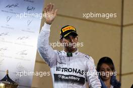 Race winner Lewis Hamilton (GBR) Mercedes AMG F1 celebrates on the podium. 06.04.2014. Formula 1 World Championship, Rd 3, Bahrain Grand Prix, Sakhir, Bahrain, Race Day.