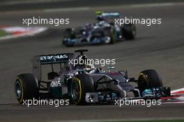 Lewis Hamilton (GBR) Mercedes AMG F1 W05 leads Nico Rosberg (GER) Mercedes AMG F1 W05. 06.04.2014. Formula 1 World Championship, Rd 3, Bahrain Grand Prix, Sakhir, Bahrain, Race Day.