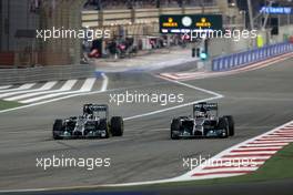 Lewis Hamilton (GBR), Mercedes AMG F1 Team and Nico Rosberg (GER), Mercedes AMG F1 Team  06.04.2014. Formula 1 World Championship, Rd 3, Bahrain Grand Prix, Sakhir, Bahrain, Race Day.