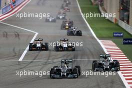 Lewis Hamilton (GBR), Mercedes AMG F1 Team and Nico Rosberg (GER), Mercedes AMG F1 Team  06.04.2014. Formula 1 World Championship, Rd 3, Bahrain Grand Prix, Sakhir, Bahrain, Race Day.