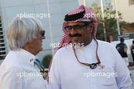 (L to R): Bernie Ecclestone (GBR) with Shaikh Abdulla Bin Isa Al-Khalifa (BRN) FIA Motorsport Council. 06.04.2014. Formula 1 World Championship, Rd 3, Bahrain Grand Prix, Sakhir, Bahrain, Race Day.