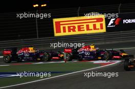 Sebastian Vettel (GER) Red Bull Racing RB10 and Daniel Ricciardo (AUS) Red Bull Racing RB10. 06.04.2014. Formula 1 World Championship, Rd 3, Bahrain Grand Prix, Sakhir, Bahrain, Race Day.