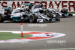 Lewis Hamilton (GBR), Mercedes AMG F1 Team and Nico Rosberg (GER), Mercedes AMG F1 Team  06.04.2014. Formula 1 World Championship, Rd 3, Bahrain Grand Prix, Sakhir, Bahrain, Race Day.