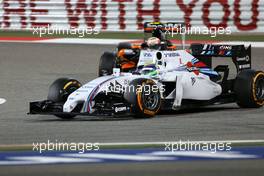 Felipe Massa (BRA), Williams F1 Team and Sergio Perez (MEX), Sahara Force India  06.04.2014. Formula 1 World Championship, Rd 3, Bahrain Grand Prix, Sakhir, Bahrain, Race Day.