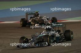 Lewis Hamilton (GBR) Mercedes AMG F1 W05 leads team mate Nico Rosberg (GER) Mercedes AMG F1 W05. 06.04.2014. Formula 1 World Championship, Rd 3, Bahrain Grand Prix, Sakhir, Bahrain, Race Day.