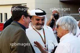 Bernie Ecclestone (GBR) with Jools Holland (GBR) and Crown Prince Shaikh Salman bin Isa Hamad Al Khalifa (BRN). 06.04.2014. Formula 1 World Championship, Rd 3, Bahrain Grand Prix, Sakhir, Bahrain, Race Day.