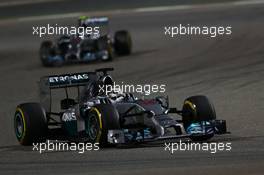 Lewis Hamilton (GBR) Mercedes AMG F1 W05 leads team mate Nico Rosberg (GER) Mercedes AMG F1 W05. 06.04.2014. Formula 1 World Championship, Rd 3, Bahrain Grand Prix, Sakhir, Bahrain, Race Day.