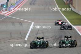 Marcus Ericsson (SWE), Caterham F1 Team and Kamui Kobayashi (JPN), Caterham F1 Team  06.04.2014. Formula 1 World Championship, Rd 3, Bahrain Grand Prix, Sakhir, Bahrain, Race Day.