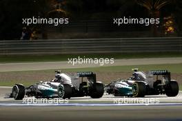 Lewis Hamilton (GBR), Mercedes AMG F1 Team and Nico Rosberg (GER), Mercedes AMG F1 Team  06.04.2014. Formula 1 World Championship, Rd 3, Bahrain Grand Prix, Sakhir, Bahrain, Race Day.