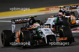 Sergio Perez (MEX) Sahara Force India F1 VJM07 leads Nico Hulkenberg (GER) Sahara Force India F1 VJM07. 06.04.2014. Formula 1 World Championship, Rd 3, Bahrain Grand Prix, Sakhir, Bahrain, Race Day.
