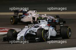 Valtteri Bottas (FIN) Williams FW36 leads team mate Felipe Massa (BRA) Williams FW36. 06.04.2014. Formula 1 World Championship, Rd 3, Bahrain Grand Prix, Sakhir, Bahrain, Race Day.