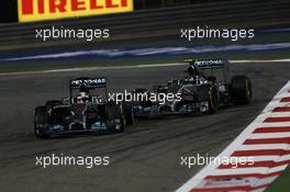 Lewis Hamilton (GBR) Mercedes AMG F1 W05 and Nico Rosberg (GER) Mercedes AMG F1 W05. 06.04.2014. Formula 1 World Championship, Rd 3, Bahrain Grand Prix, Sakhir, Bahrain, Race Day.