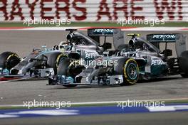 Lewis Hamilton (GBR), Mercedes AMG F1 Team and Nico Rosberg (GER), Mercedes AMG F1 Team  06.04.2014. Formula 1 World Championship, Rd 3, Bahrain Grand Prix, Sakhir, Bahrain, Race Day.