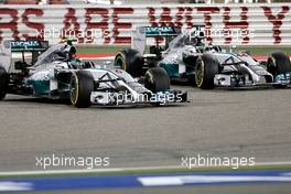 Lewis Hamilton (GBR), Mercedes AMG F1 Team and Nico Rosberg (GER), Mercedes AMG F1 Team  06.04.2014. Formula 1 World Championship, Rd 3, Bahrain Grand Prix, Sakhir, Bahrain, Race Day.