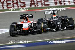 Jules Bianchi (FRA), Marussia F1 Team  and Adrian Sutil (GER), Sauber F1 Team  06.04.2014. Formula 1 World Championship, Rd 3, Bahrain Grand Prix, Sakhir, Bahrain, Race Day.