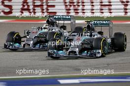 Lewis Hamilton (GBR), Mercedes AMG F1 Team and Nico Rosberg (GER), Mercedes AMG F1 Team  06.04.2014. Formula 1 World Championship, Rd 3, Bahrain Grand Prix, Sakhir, Bahrain, Race Day.