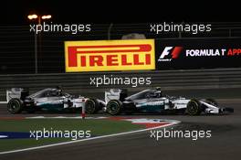 Nico Rosberg (GER) Mercedes AMG F1 and Lewis Hamilton (GBR) Mercedes AMG F1. 06.04.2014. Formula 1 World Championship, Rd 3, Bahrain Grand Prix, Sakhir, Bahrain, Race Day.