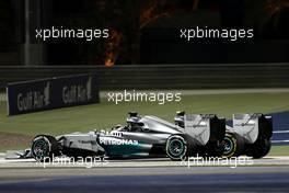 Lewis Hamilton (GBR), Mercedes AMG F1 Team and Nico Rosberg (GER), Mercedes AMG F1 Team  06.04.2014. Formula 1 World Championship, Rd 3, Bahrain Grand Prix, Sakhir, Bahrain, Race Day.