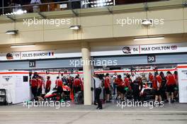 (L to R): Jules Bianchi (FRA) Marussia F1 Team MR03 and Max Chilton (GBR) Marussia F1 Team MR03 in the pits. 05.04.2014. Formula 1 World Championship, Rd 3, Bahrain Grand Prix, Sakhir, Bahrain, Qualifying Day.