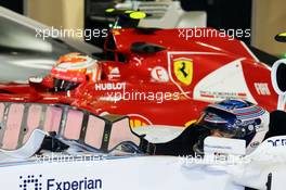 Valtteri Bottas (FIN) Williams FW36 and Kimi Raikkonen (FIN) Ferrari F14-T in parc ferme. 05.04.2014. Formula 1 World Championship, Rd 3, Bahrain Grand Prix, Sakhir, Bahrain, Qualifying Day.