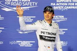 Nico Rosberg (GER) Mercedes AMG F1 W05 celebrates his pole position in parc ferme. 05.04.2014. Formula 1 World Championship, Rd 3, Bahrain Grand Prix, Sakhir, Bahrain, Qualifying Day.