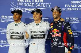 Qualifying top three in parc ferme (L to R): Lewis Hamilton (GBR) Mercedes AMG F1, second; Nico Rosberg (GER) Mercedes AMG F1, pole position; Daniel Ricciardo (AUS) Red Bull Racing, third. 05.04.2014. Formula 1 World Championship, Rd 3, Bahrain Grand Prix, Sakhir, Bahrain, Qualifying Day.