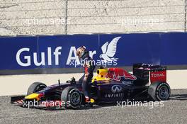 Sebastian Vettel (GER) Red Bull Racing RB10 spins off the circuit in FP3. 05.04.2014. Formula 1 World Championship, Rd 3, Bahrain Grand Prix, Sakhir, Bahrain, Qualifying Day.